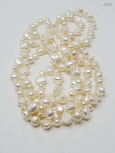 Strand of White Freshwater Pearls - 60 in.