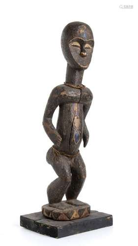 A PAINTED WOOD FIGURE Nigeria, Eket  76 cm high