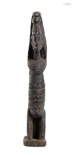 A WOOD SCULPTURE OF A KNEELING FIGURE Mali, Dogon  36