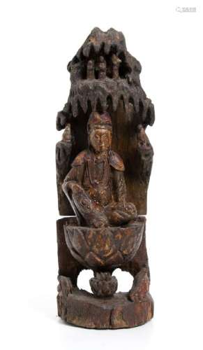 A PAINTED WOOD GUANYIN IN THE GROTTO China, Qing