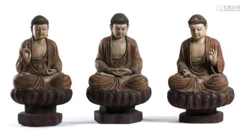 THREE PAINTED WOOD SCULPTURES OF BUDDHA Ming dynasty