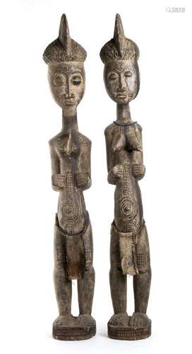 A PAIR OF WOOD, TEXTILE AND BEADS FIGURES Ivory Coast,