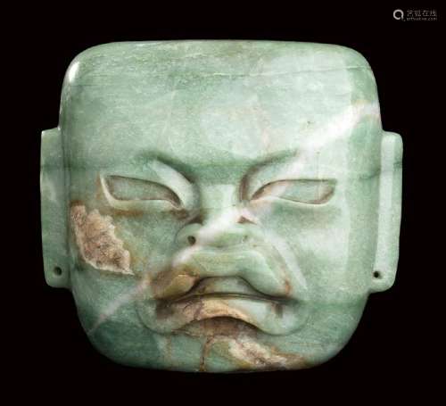 A GREEN JADE MASK Olmec style  21 cm high  Provenance: