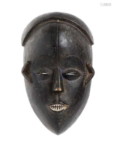 A PAINTED WOOD MASK Ivory Coast, Bete  28 cm high