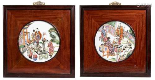 A PAIR OF POLYCHROME PORCELAIN PLAQUES WITH WOODEN
