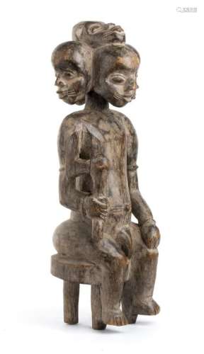 A WOOD FIVE HEADS FIGURE Cameroon  57 cm high