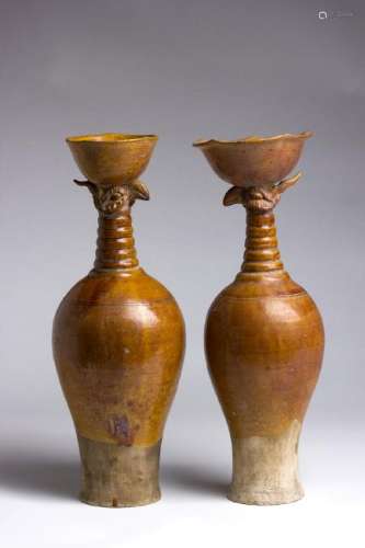 A PAIR OF AMBER-GLAZED CERAMIC âPHOENIX HEADâ VASES