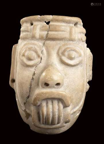 A STONE MASK Olmec style  21,5 cm high  Provenance: