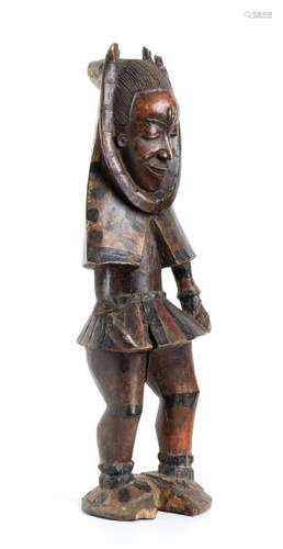 A PAINTED WOOD FIGURE    Ivory Coast, Guro  65 cm high