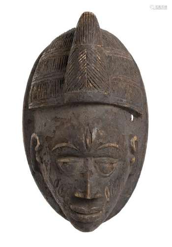 A WOOD MASK   Nigeria, Yoruba  36 cm high  Provenance: