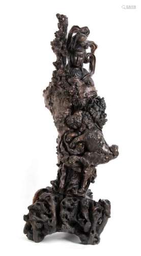 A LARGE ROOT CARVING OF A GUANYIN China, late Qing