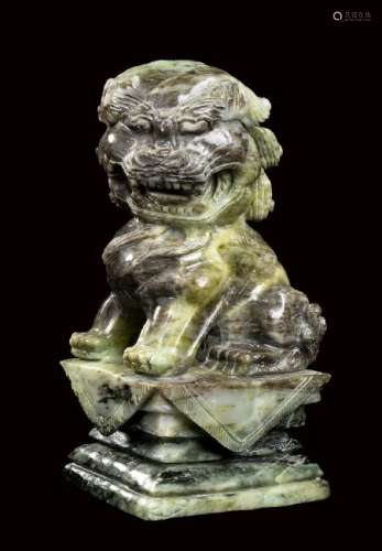 A CARVED HARDSTONE BUDDHIST LION China, 20th century