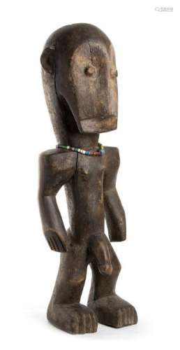 A WOOD AND BEADS FIGURE Africa  57 cm high  Provenance: