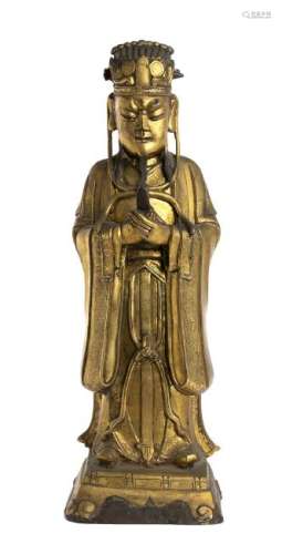 A GILT BRONZE FIGURE OF A DIGNITARY China, Ming