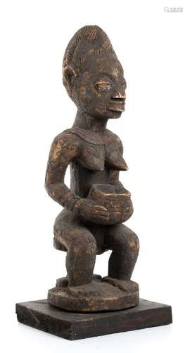 A YORUBA WOOD FEMALE FIGURE   Nigeria, Yoruba  66 cm