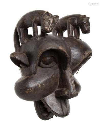 A WOOD AND METAL MASK Cameroon, Bamileke  47 cm high