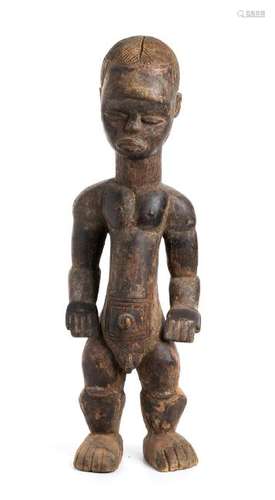 A WOOD MALE FIGURE     Ivory Coast, Bete  68 cm high