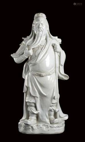 A LARGE 'BLANC DE CHINE' PORCELAIN FIGURE OF GUANDI