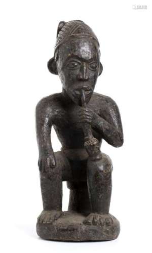 A WOOD FIGURE WITH PIPE Cameroon  62 cm high