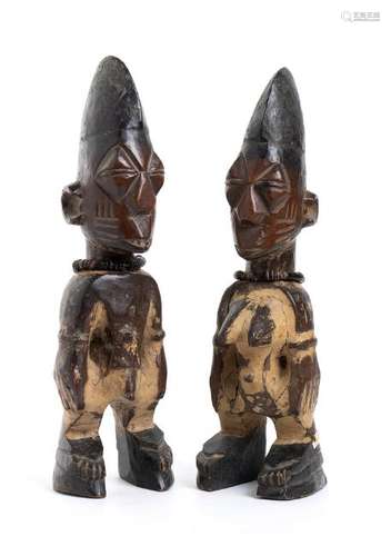 A PAIR OF WOOD AND HORN BEADS 'ERE IBEJI' Nigeria,