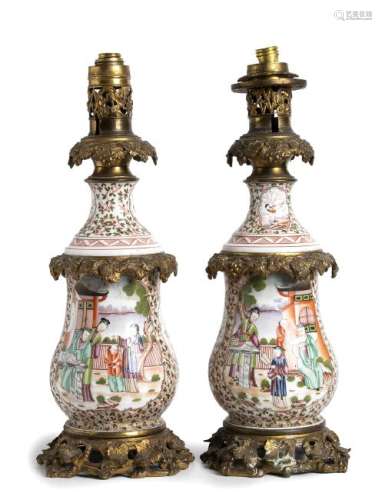 A PAIR OF 'CANTON' PORCELAIN BALUSTER VASES MOUNTED AS