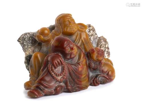 A  SOAPSTONE CARVING OF TWO LOHAN AND A FELINE China
