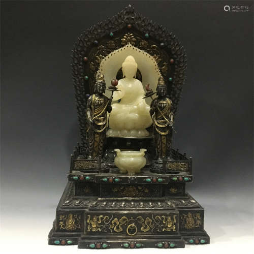 CHINESE CELADON JADE SEATED BUDDHA IN PARTLY GILT SILVER NICHE