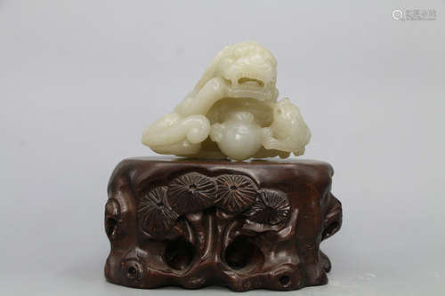 CHINESE JADE LION ON ROSEWOOD BASE