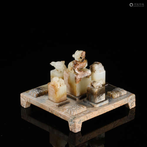 FIVE CHINESE ANCIENT JADE BEAST SEALS ON STAND