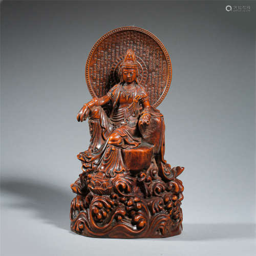 CHINESE BOXWOOD SEATED GUANYIN ON WAVES