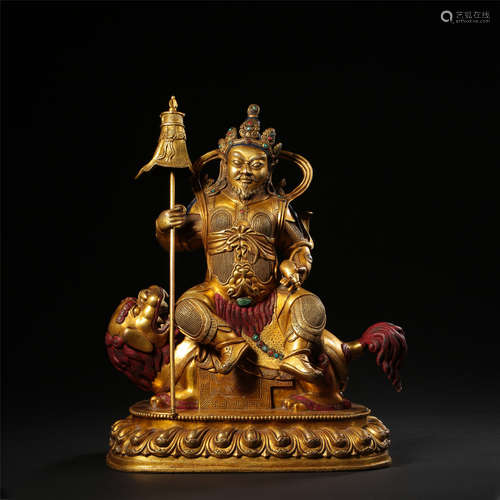 CHINESE GILT BRONZE SEATED GOD OF WEALTH ON LION