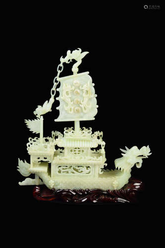 A Xiuyan Lotus Jade Carved Dragon Boat Ornament