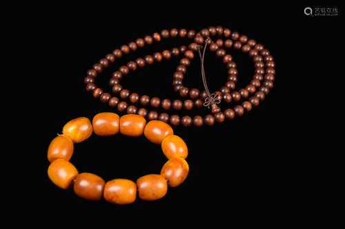 A Padauk (Zitan) Wood Praying Bead Necklace and a Reconstituted Amber Bracelet