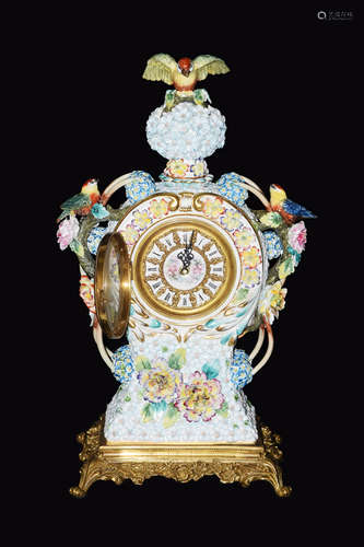 A Continental Porcelain Clock Fully Covered with Flowers and Three Birds