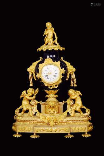 A French Indigo Porcelain Clock with Gilt Bronze Cherubs Figural, Filigree, and Base