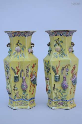 A pair of relief vases in Chinese porcelain 'flowers'