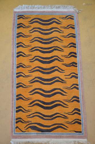 A Tibetan tiger rug with yellow background