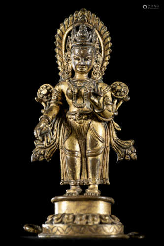 A Nepalese statue in gilt bronze, 18th century