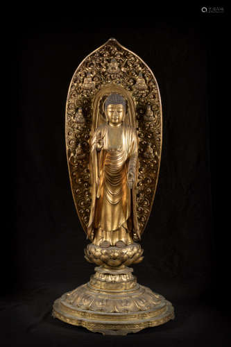 Large Japanese wooden sculpture with gold lacquer 'standing Buddha'
