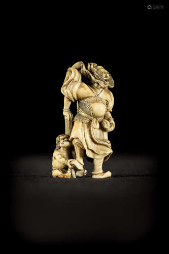 Japanese ivory netsuke 'man with oni', Meiji period