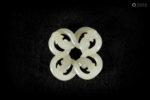 A pendant in jade 'four dragons'