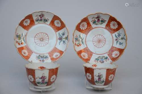 Pair of cups and saucers in Chinese porcelain 'iron-red decoration', 18th century