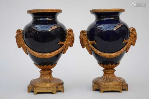 Pair of vases in blue porcelain with gilt mounts
