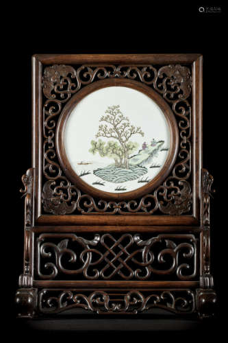 A Chinese hardwood table screen with porcelain plaque