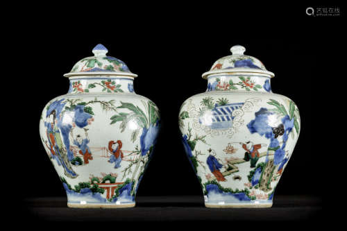A pair of Chinese Wucai vases 'children playing', 17th century