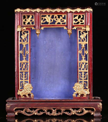 A WOOD CARVED PAINTED BUDDHIST STAGE