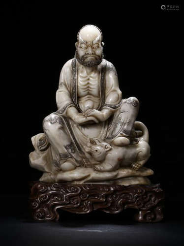 A SOAPSTONE CARVED FUHU LUOHAN BUDDHA