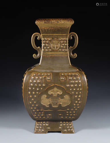 A BROWN GLAZE RIVET PATTERN ZUN VASE