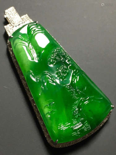 A GREEN JADEITE CARVED LANDSCAPE PENDANT, TYPE A