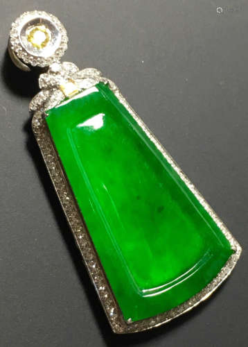 A GREEN JADEITE CARVED PINGAN PENDANT, TYPE A